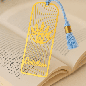 Marque-page doré Omsaé Protection Divine orné d’yeux protecteurs et d’étoiles, symbole de sécurité et d’énergie bienveillante, accessoire de lecture spirituel et porte-bonheur zen